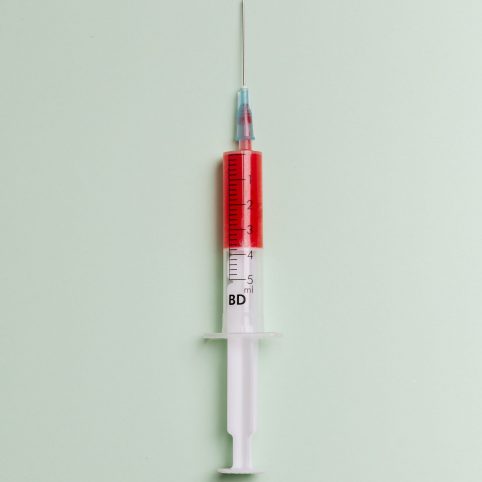Image of needle filled with blood