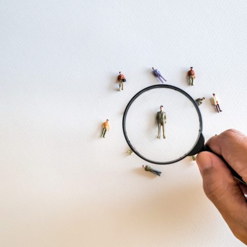 Human,Resource,Management,And,Recruitment,And,Hiring,Concept.,Find,Leader. Looking through a microscope